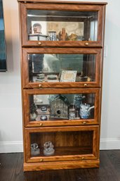Four-tier Barrister Style Bookcase Finished In Mahogany And Polished Brass Knobs