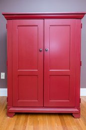 Nice Brick Red Armoire With Paneled Door Fronts And Interior Pull Out Shelves