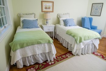 Set Of Twin Beds With Beautiful Matelasse Quilt And Printed Shams