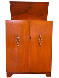 MCM Flip Top Liquor Cabinet .