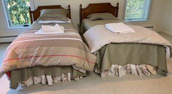 Two Twin Beds With Extra Bedding