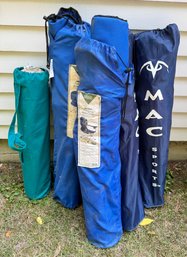 Four Travel Chairs And One Table