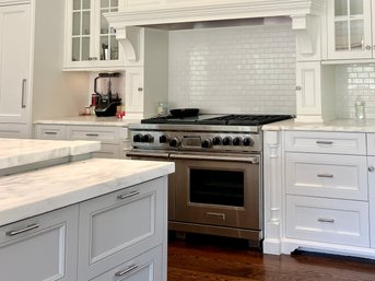 A Wolf Dual Fuel 48 Inch Gas Range - Stainless Steel