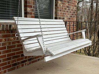 A Charming Porch Swing In Painted Wood