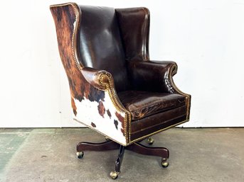 A Stylish Cowhide And Leather Executive Chair With Nailhead Trim By Hancock & Moore