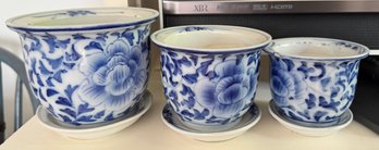 Three Blue And White Planters