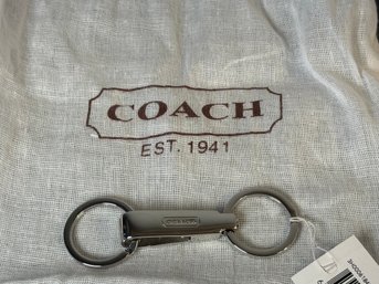A Coach Valet Key Chain With Dust Bag