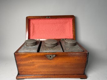 An Antique Wooden Tea Caddy