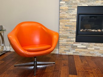 A Vintage 1970s Retro Orange Vinyl Pod Swivel Chair