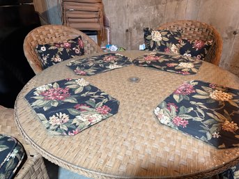 Wicker Table With Glass Top And 4 Barrel Chairs With Cushions And Umbrella Stand