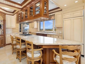 A Granite Counter Island - Custom Cabinetry - Viking Cooktop