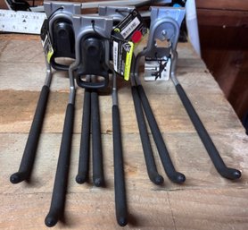 Four Rubbermaid Multi-purpose Hooks