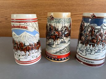 3 Vintage Budweiser Holiday Steins.  1985, 1988, 1989