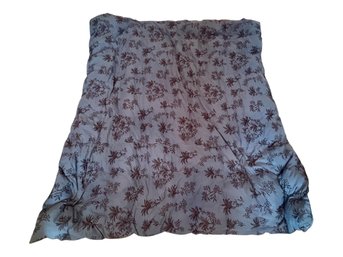 Two Matching Blue Floral Patterned (outlined In Black) Comforters