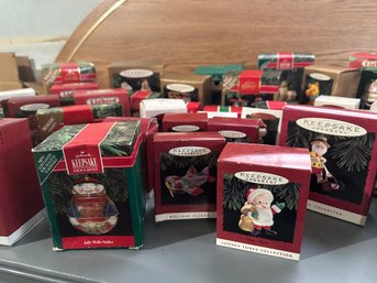 Approximately 50 Hallmark Keepsake Ornaments In Boxes