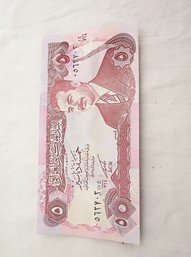 Iraqi Currency With Image Of Saddam Hussein