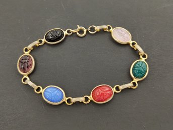 Vintage Egyptian Revival Molded Glass Scarab Bracelet