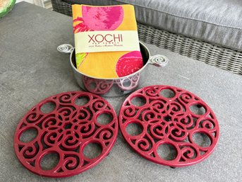 Sur La Table Tea Towels With Trivets And A Pewter Serving Bowl