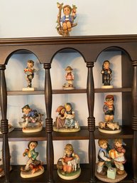 Goebel Figurine Collection And Shelf