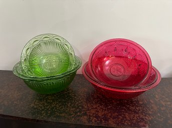 2 Sets Of Colored Glass Bowls