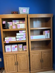 Setof Two Bookcases With 3 Shelves On Top And Two Door Cabinet On Bottom