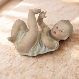 Vintage German Heubach Bisque  Piano Baby Figurine Hand-Painted Face Detailed Limbs Playing With Toes