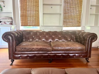 A Leather Chesterfield Tufted 84 Inch Sofa