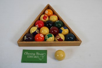 Rack Of Mini Pool Balls And Que