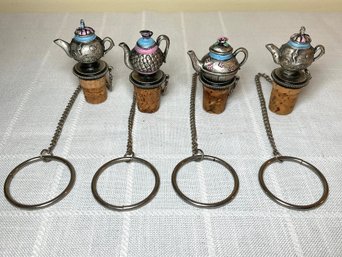 Four Vintage Pewter & Cork Wine Stoppers