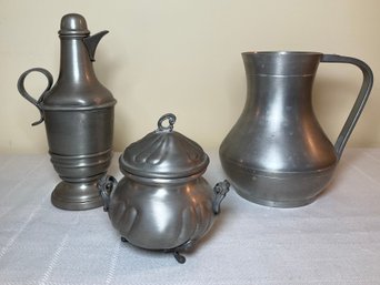 A Selection Of Vintage Pewter Vessels