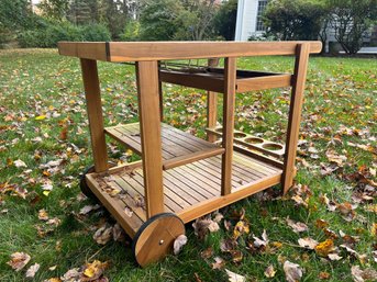 A Safavieh Teak Outdoor Tea /  Bar Cart
