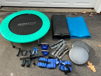 Lot Of Exercise Equipment Including Kettle Bells, Trampoline, Weights, And More