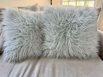 A Pair Of Faux Mongolian Lamb Cushions - 17 X 17