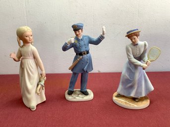 Mixed Figurines Lot Of 3 Policeman, Women, And Little Girl
