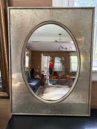Metal Mirror With Oval Opening