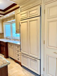 A Sub Zero 650 - 36 Inch - Fridge Over Freezer - Custom Panels