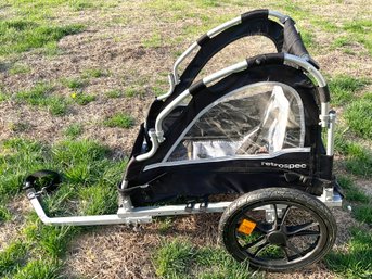 A Retrospec Rover Child Bicycle Tow Behind Trailer