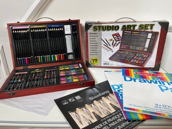 A Set Of Art Supply Boxes And Paper - New