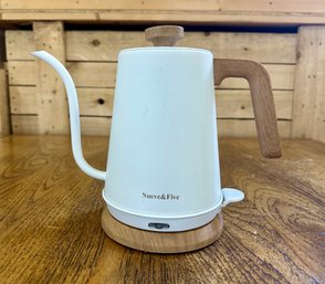 A Cute Electric Tea Kettle With Wood Handle -