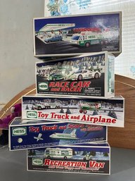 Five Vintage Hess Trucks All Sealed