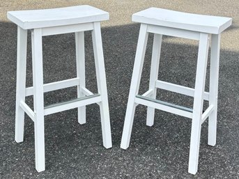A Pair Of Painted Wood Saddle Stools
