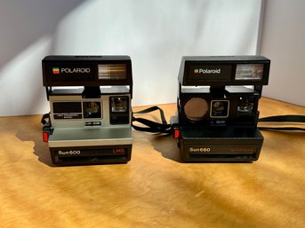Vintage Polaroid Sun 600 LMS Paired With A Polaroid Sun 660 Autofocus