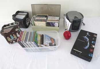A Timex T601G Mini Stereo-CD Player With A Collection Of CD's