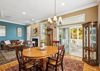 A Beautiful Solid Wood Dining Table With Pedestal Base