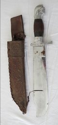 A Fixed Blade Dagger With Sheath With Eagles Head Pommel And Leather Sheath