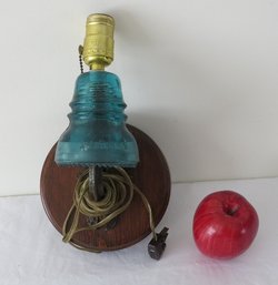 A Telephone Insulator On Bracket Wall Lamp