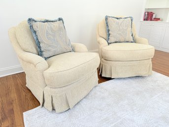 Pair Of Upholstered Swivel Rocking Chairs