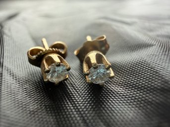 Pair Of 14k Gold Diamond Stud Earrings