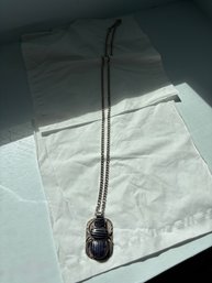 Vintage-style Egyptian Revival Scarab Pendant, Featuring A Silver Setting Inlaid With Blue Lapis Lazuli.