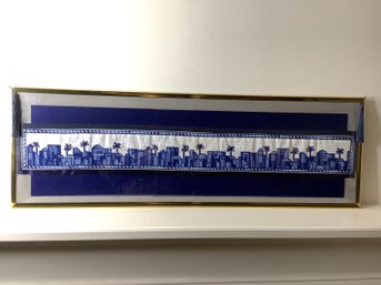 Framed Piece Of Decorative Needlework With Blue & White Cityscape Design